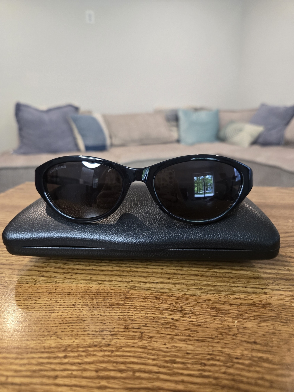 Balenciaga Women’s Black Curved Frame Sunglasses